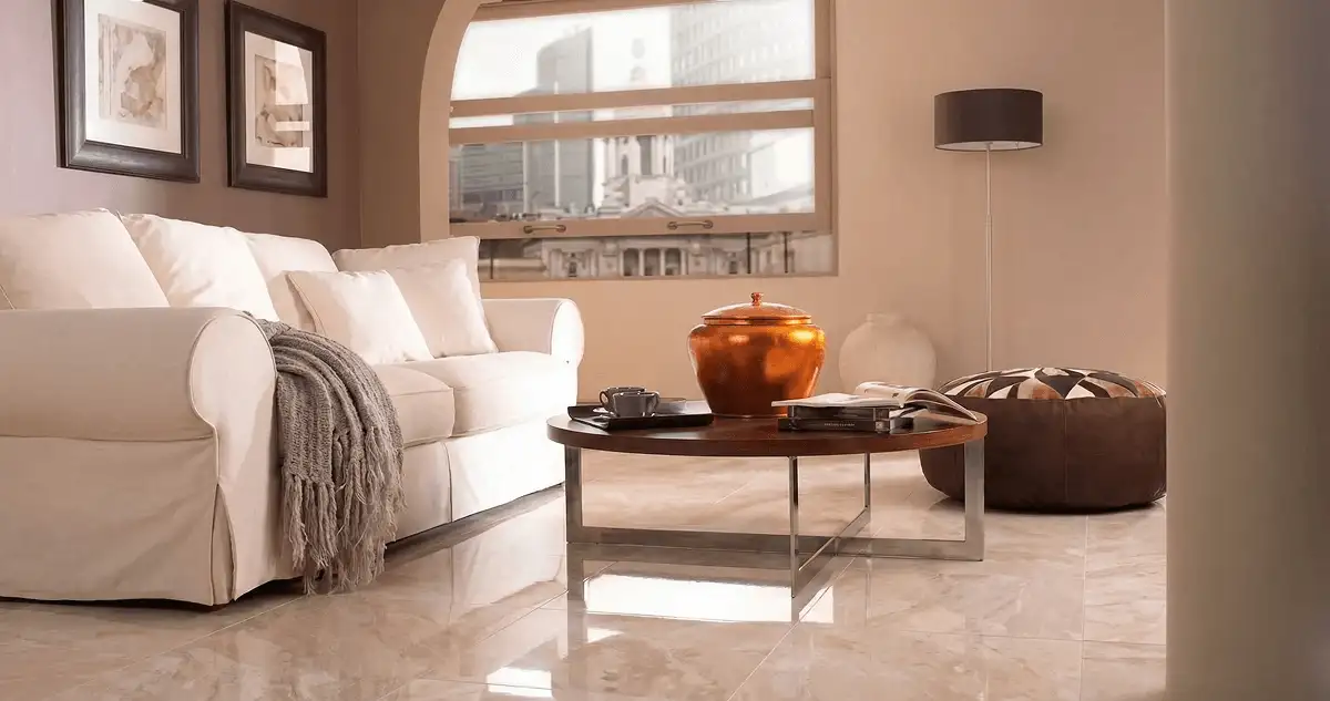 Modern living room with professionally installed marble flooring, a beige sofa, coffee table in Pittsburgh, PA