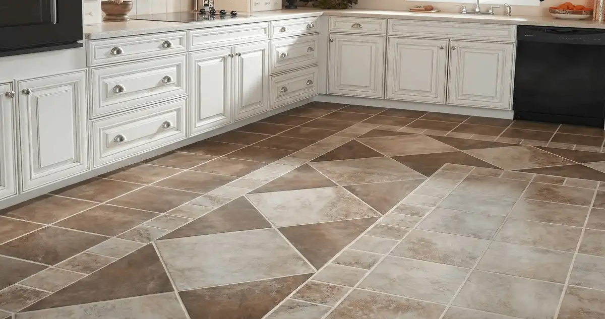Kitchen with white cabinets and a professionally installed tile floor in Pittsburgh, PA