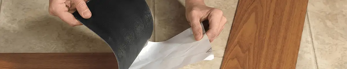 A professional installing vinyl flooring in Pittsburgh, PA