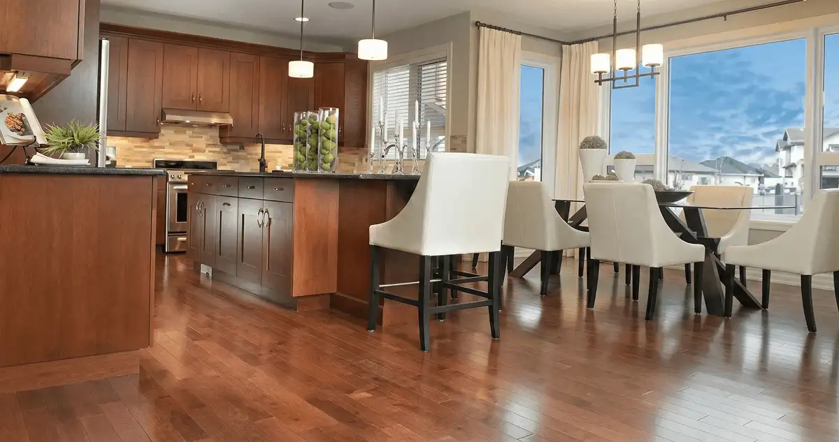 A modern kitchen with professionally installed wood flooring in Pittsburgh, PA